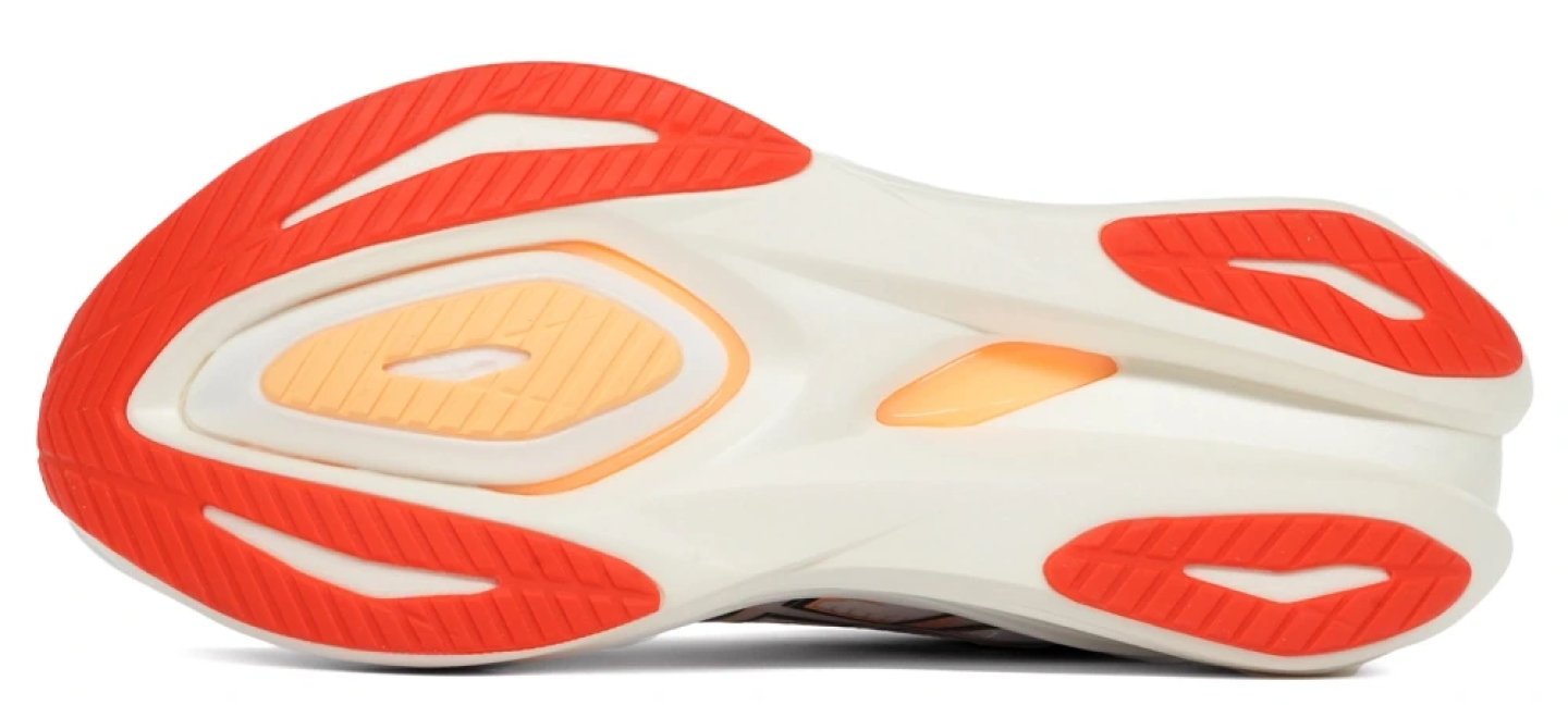Bottom view of the Asics Sonic Blast 2 Ignite running shoe outsole with red rubber pods and cream midsole foam.