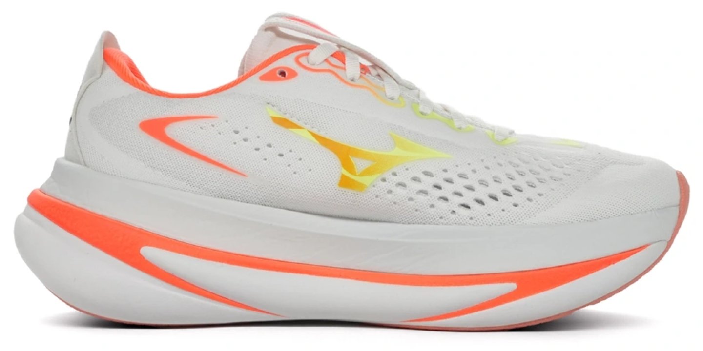 Mizuno Sky Prime Foam running shoe in white with coral orange midsole and yellow Mizuno logo, lateral side view