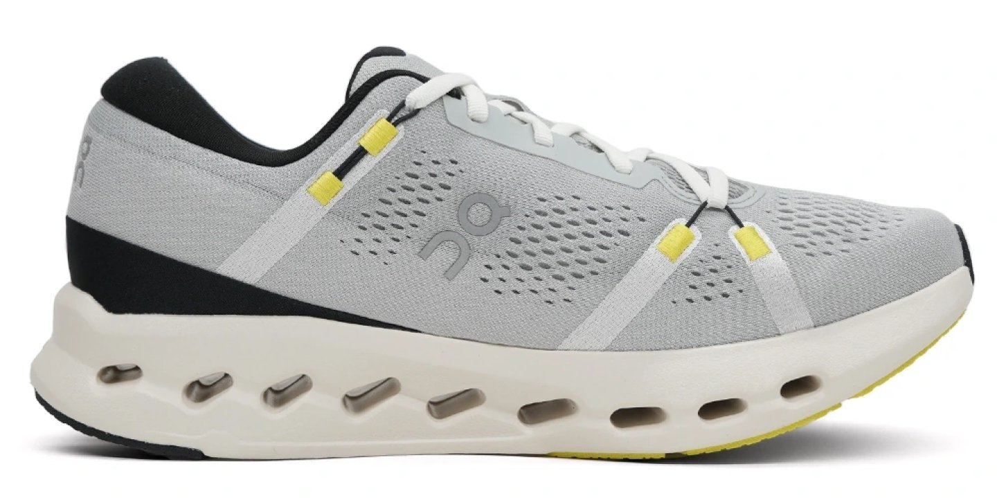 On Cloudsurfer 2 running shoe medial side view in glacier grey with yellow lace details and white CloudTec midsole