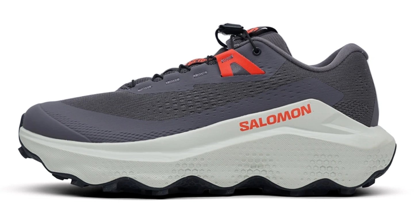 Salomon Ultra Glide 3 trail running shoe in grey and white with red branding accents, lateral side view