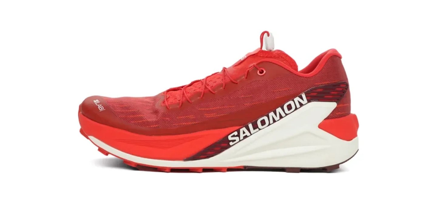 Salomon Sense Ride 5 trail running shoe in red and white colorway, lateral side view on white background