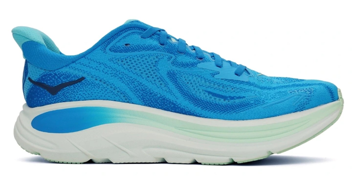 Women's Hoka running shoe in bright cyan blue with white maximalist midsole and mint green outsole, lateral view