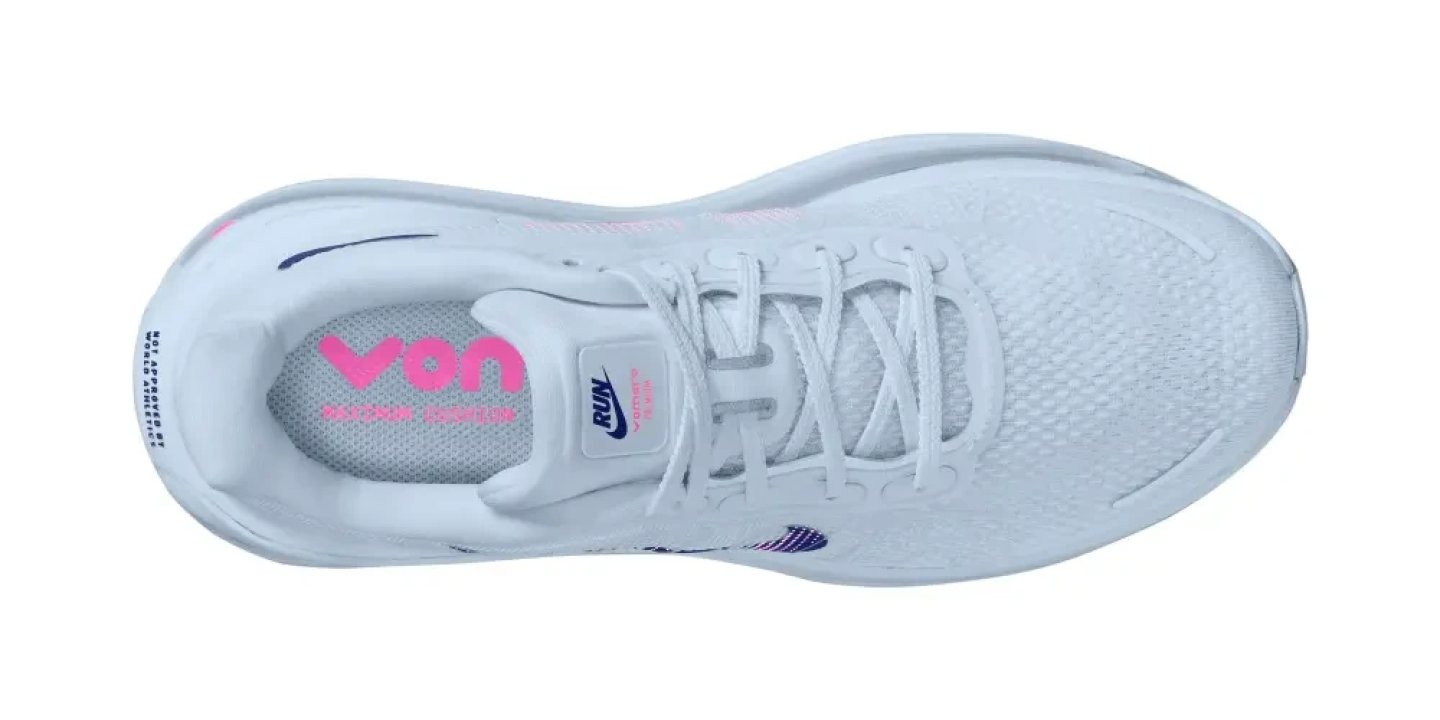 Top-down view of Nike Vomero Fleek women's running shoe in white with pink and navy accents and white laces