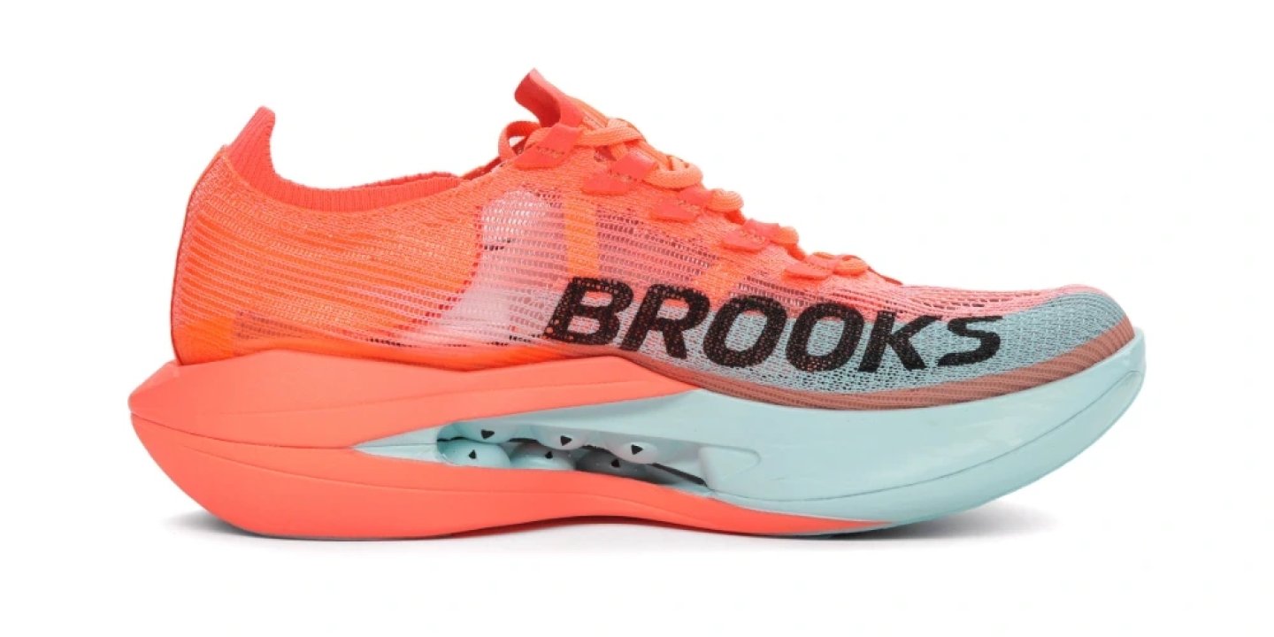 Brooks Hyperion Elite running shoe in coral orange and mint blue with knit upper and curved carbon plate midsole
