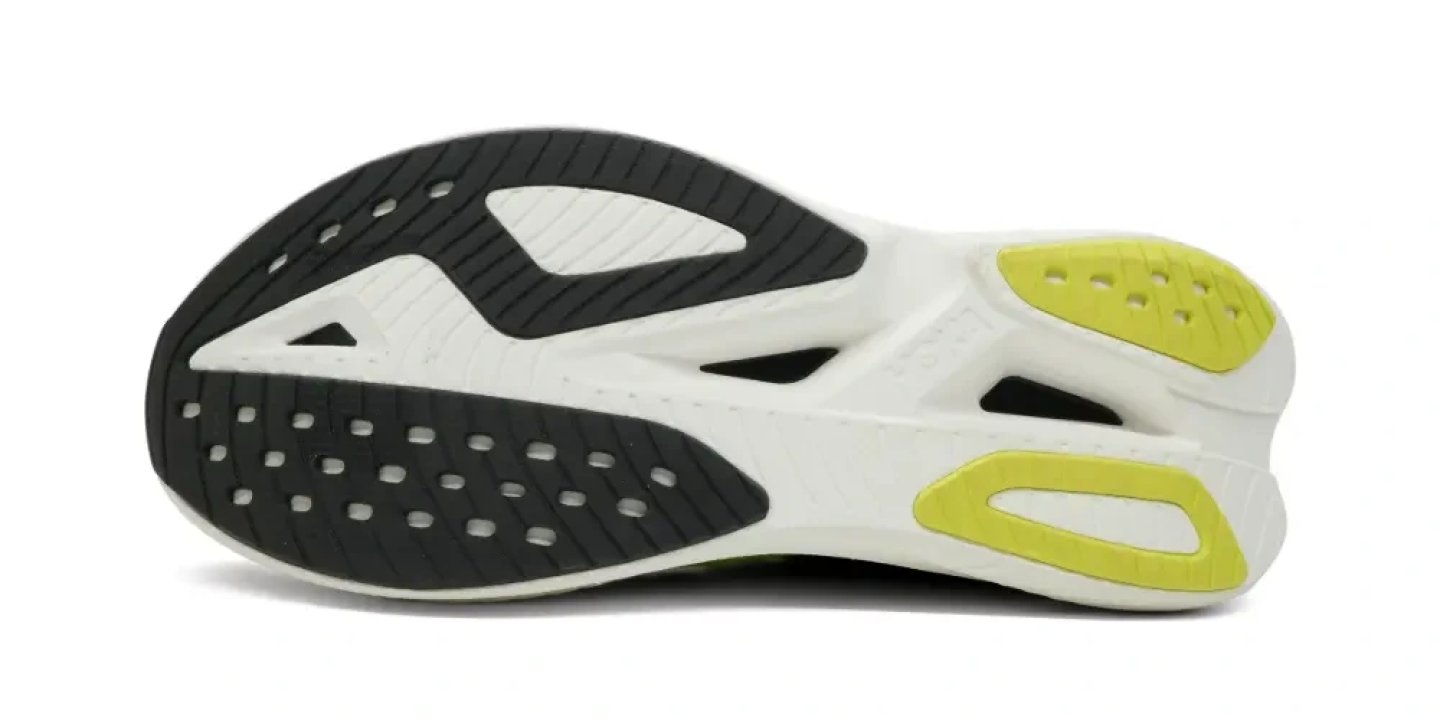 Bottom view of Hoka Mach 3 running shoe outsole showing black rubber traction zones, white midsole.