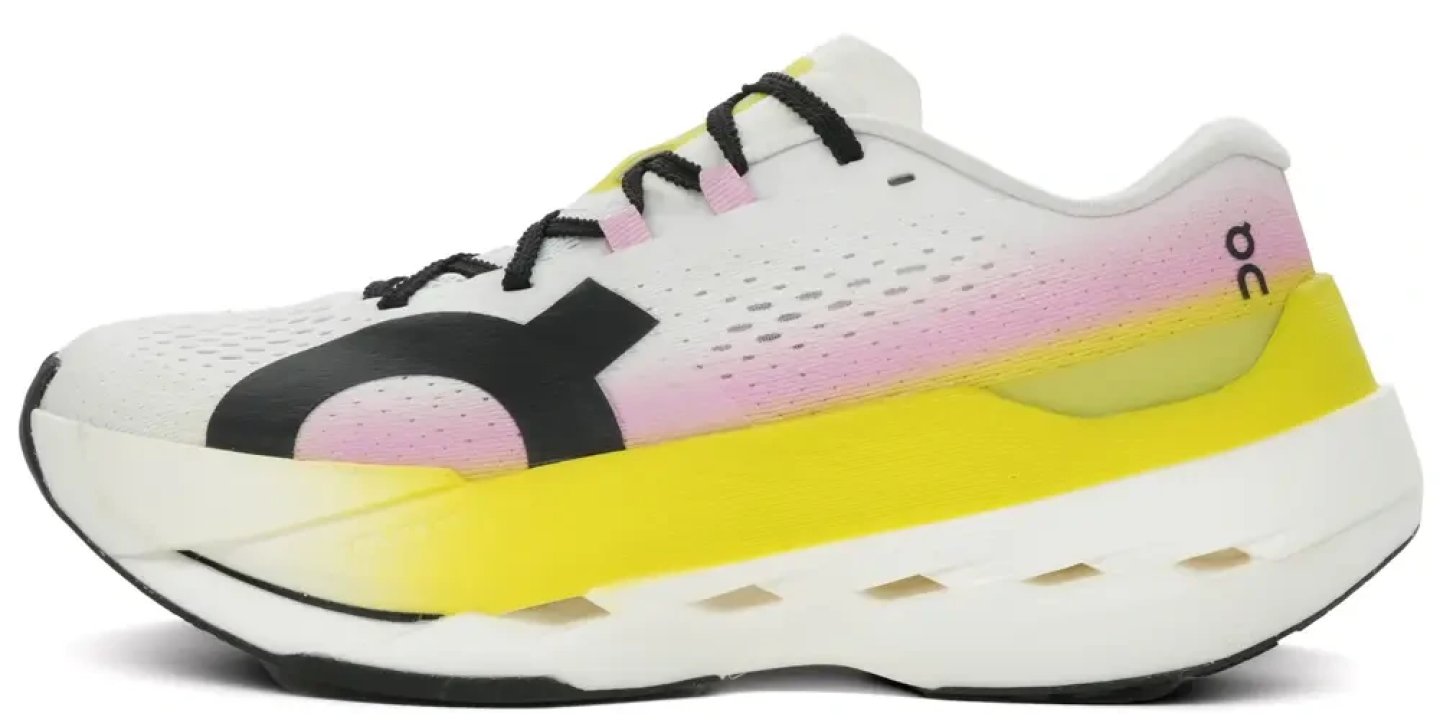On Cloudboom Echo 3 running shoe in white with pink-to-yellow gradient midsole and black laces, lateral view