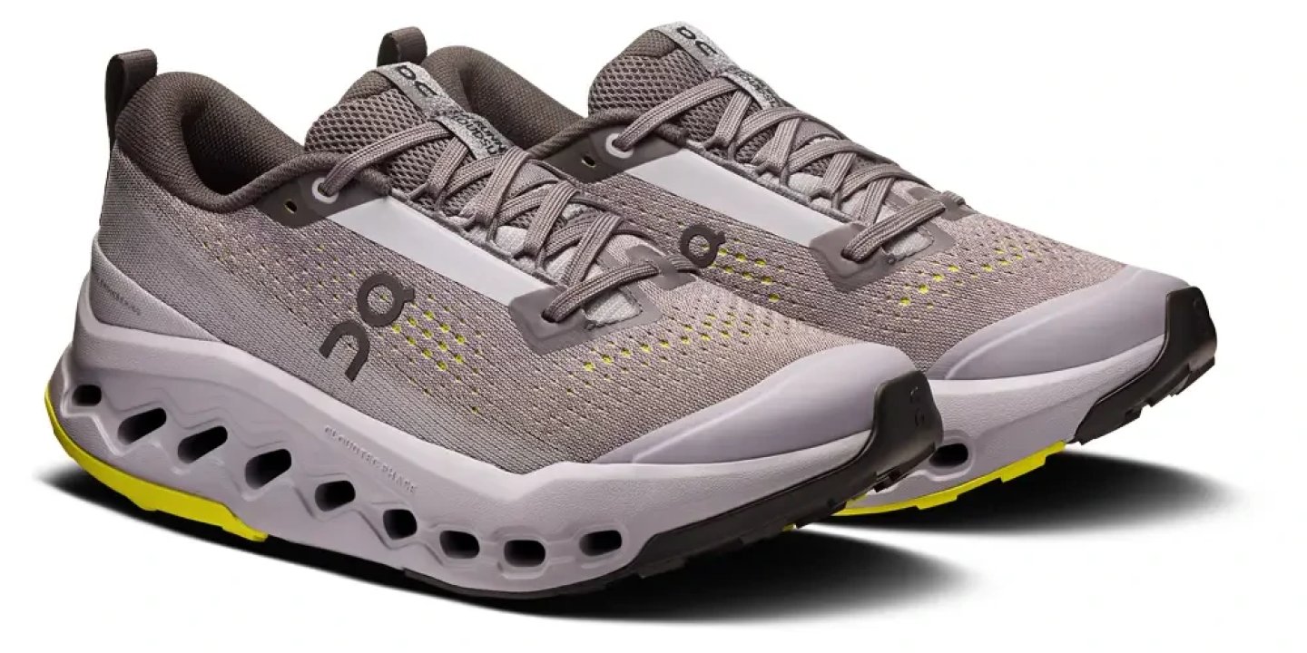 Pair of On Cloudsurfer men's running shoes in grey with lime yellow accents and CloudTec midsole cutouts