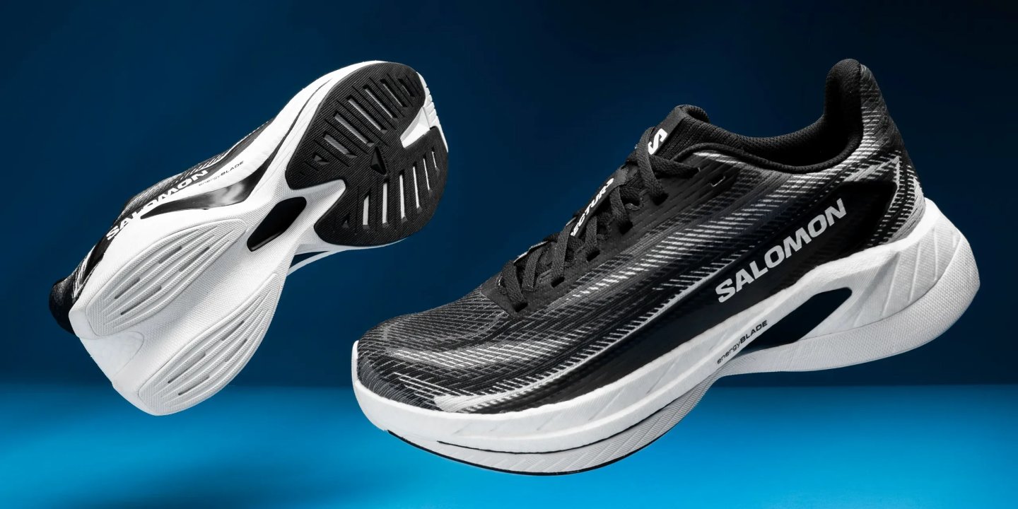 Salomon EnergyBlade running shoes in black and white shown from sole and lateral profile angles.